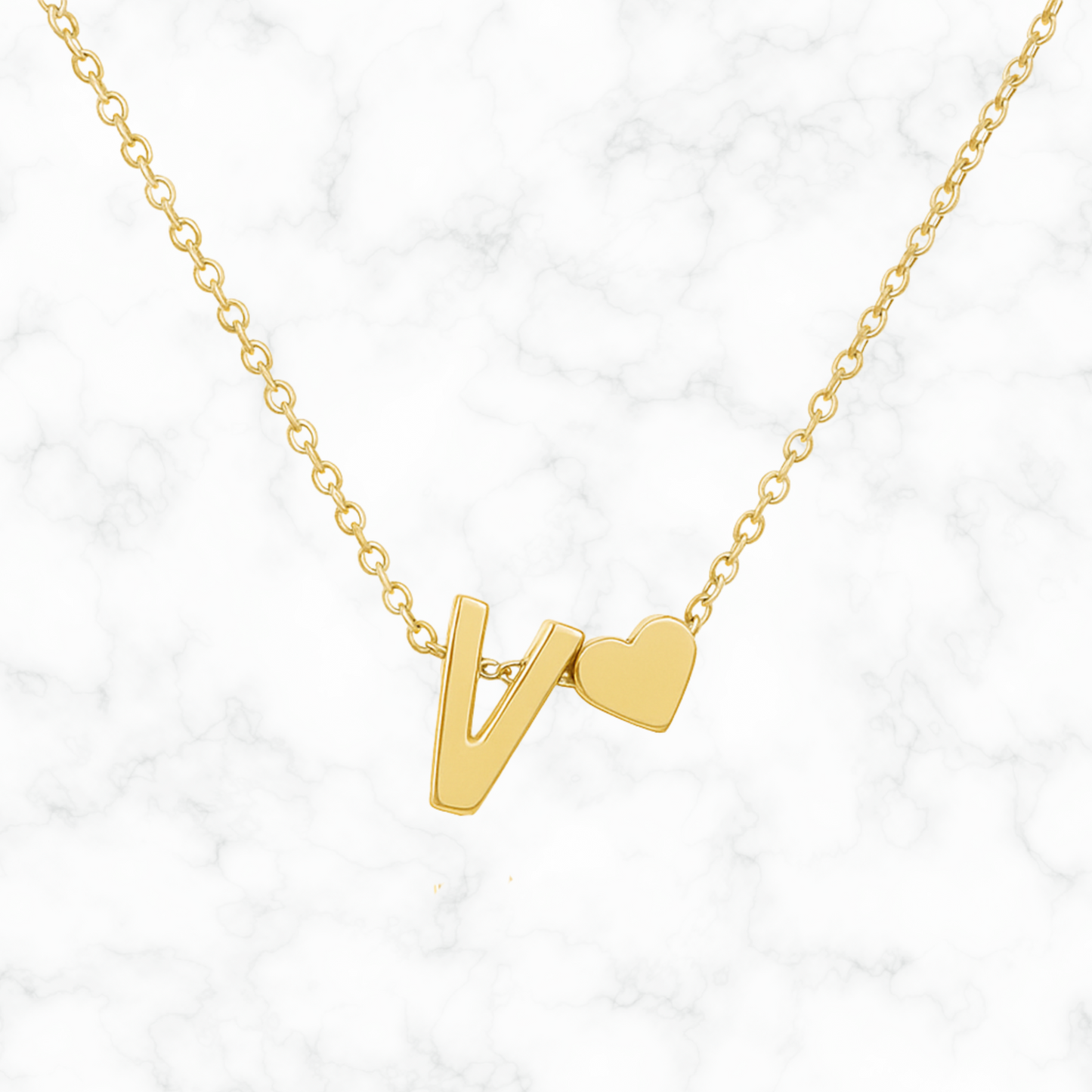 Initiaal/hartje ketting