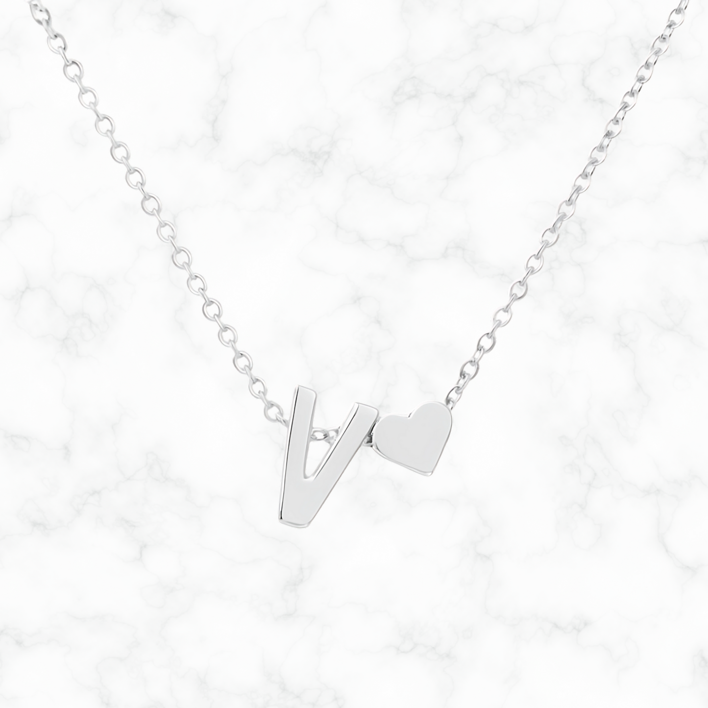 Initiaal/hartje ketting